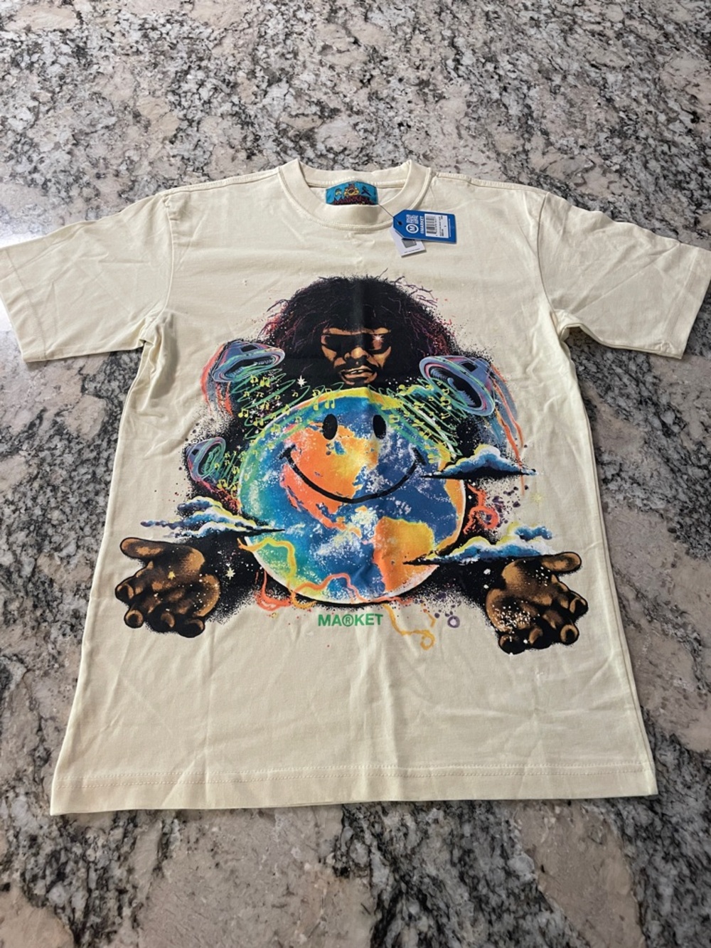 M@rket Cream Short Sleeve Tee with Colorful Smiling Earth Graphic nwt